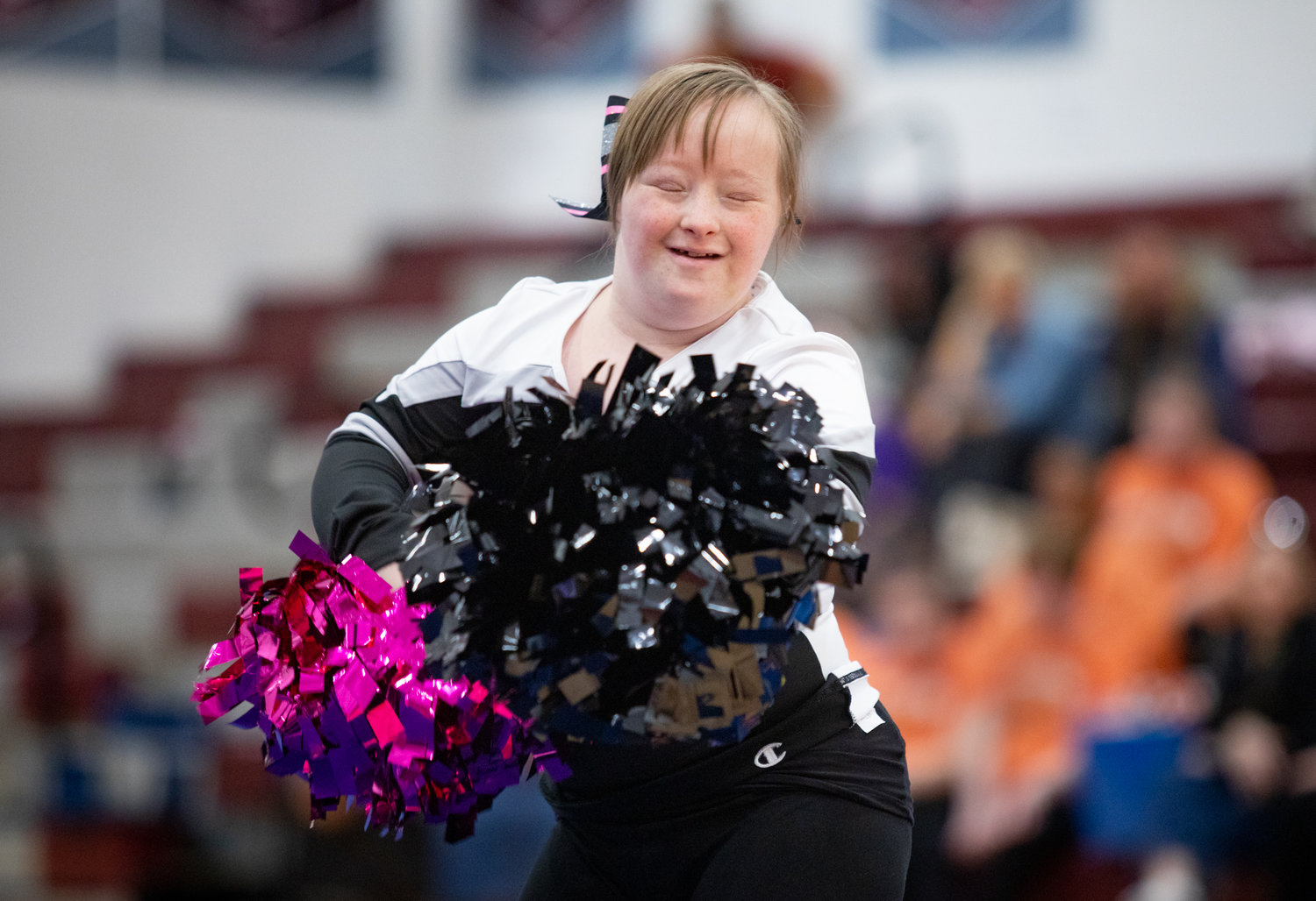 An athlete dances and shakes her pompoms for the crowd at the Special Olympics at Seaforth on Saturday.